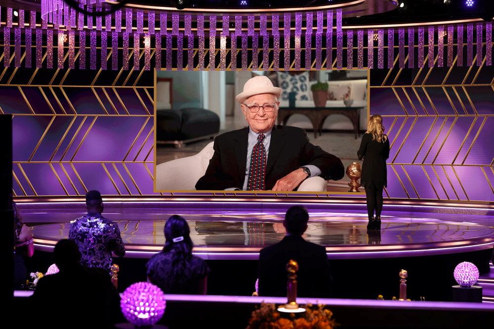 Honoree Norman Lear accepts the Carol Burnett Award with Amy Poehler in this handout photo from the 78th Annual Golden Globe Awards in Beverly Hills  / NBC HANDOUT