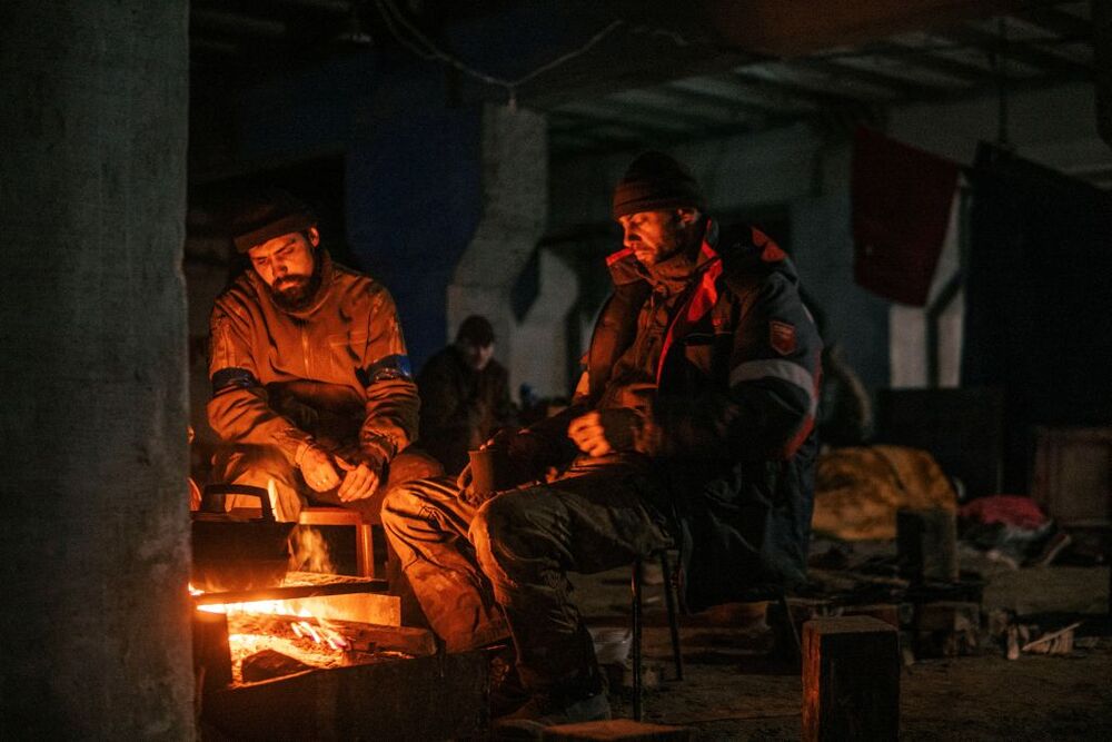 Ukrainian Azovstal service members are seen within the Azovstal Iron and Steel Works complex in Mariupol