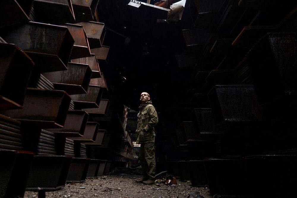 Ukrainian Azovstal service members are seen within the Azovstal Iron and Steel Works complex in Mariupol  / DMYTRO OREST KOZATSKYI/AZOV REGIMENT PRESS SERVICE